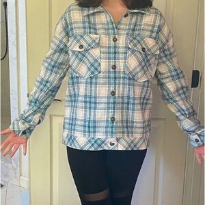 Women’s blazer jacket.  Nice dress jacket or evening casual.